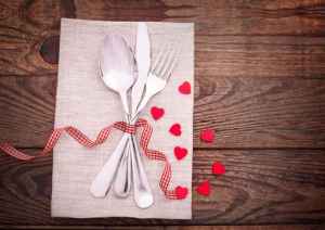 Valentines dinner on wooden background